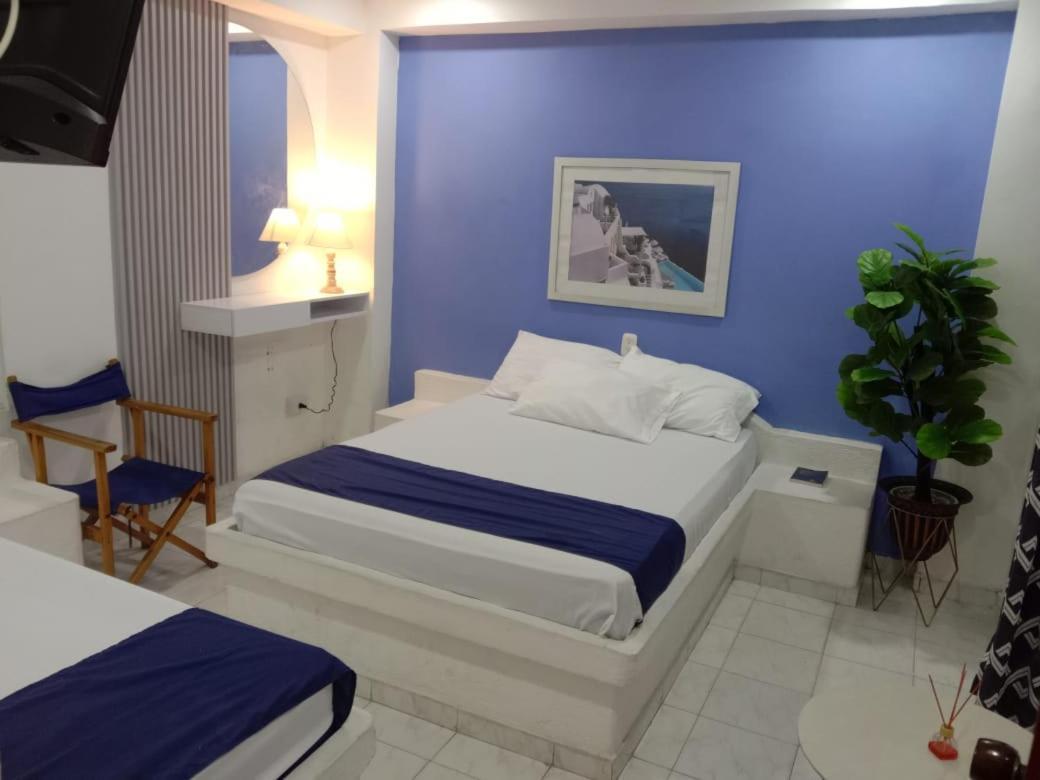 Habitación Doble Deluxe (2 adultos + 1 niño)
